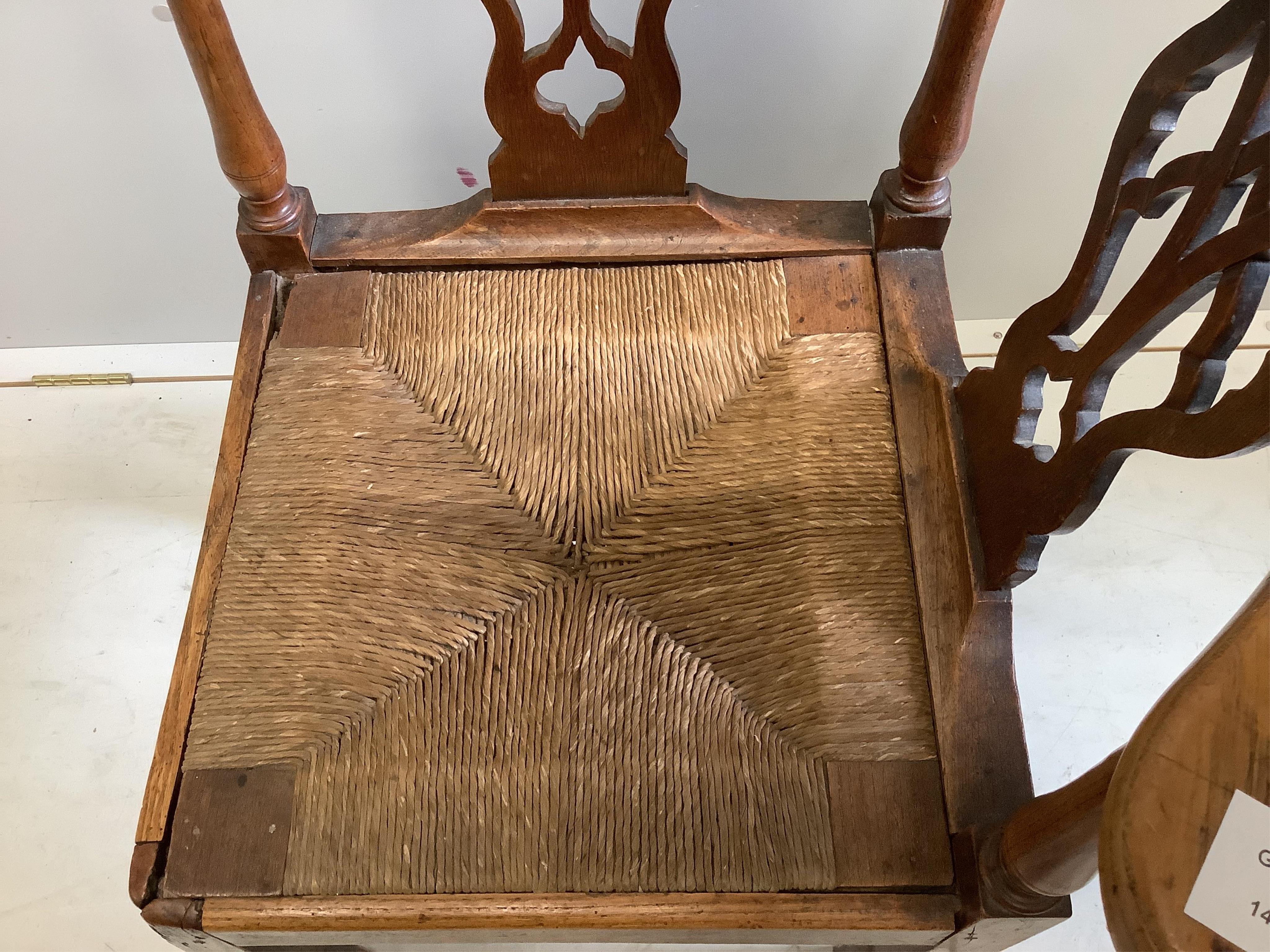 Two George III corner elbow chairs, one oak, one mahogany, larger width 76cm, depth 64cm, height 85cm. Condition - poor to fair